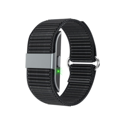 Black woven nylon tracker band with a lit sensor window on the underside
