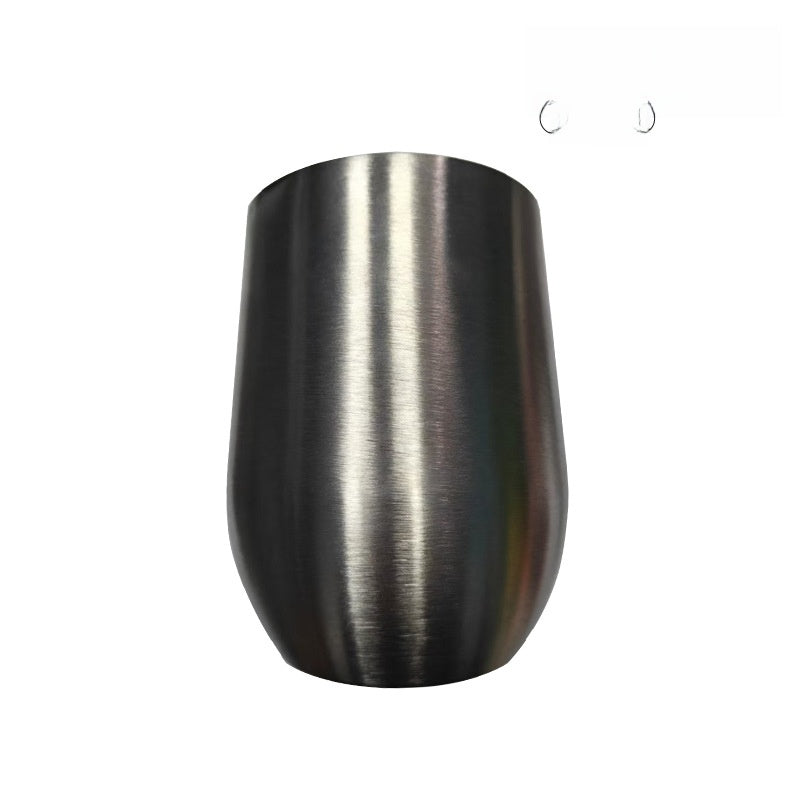 Stemless double-wall stainless steel insulated tumbler shown from the front with its clear press-on lid