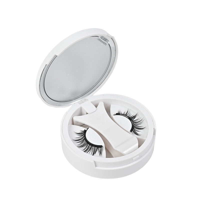 Magnetic false eyelashes being snapped onto natural lashes