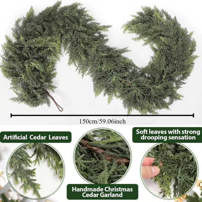 Green artificial cedar Christmas garland laid flat with closeups of the soft drooping leaves and a hanging loop