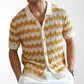 Yellow open knit ripple polo shirt worn open with short ribbed sleeves
