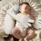 Baby soothing hugging pillow shown with its packaging presentation