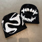 Acrylic knit ghost pattern beanie in white with a one size stretch fit