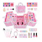 Pink beauty case with palettes, brushes, sponges, lip color, nail polish, press-on nails and a bracelet laid out around it