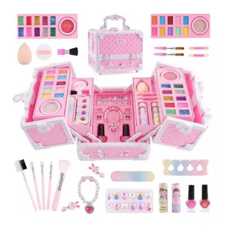 Pink beauty case with palettes, brushes, sponges, lip color, nail polish, press-on nails and a bracelet laid out around it