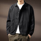Workwear shirt jacket laid flat showing two chest flap pockets and the full button front