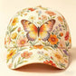 Adjustable polyester baseball cap showing its floral print and eyelet vents