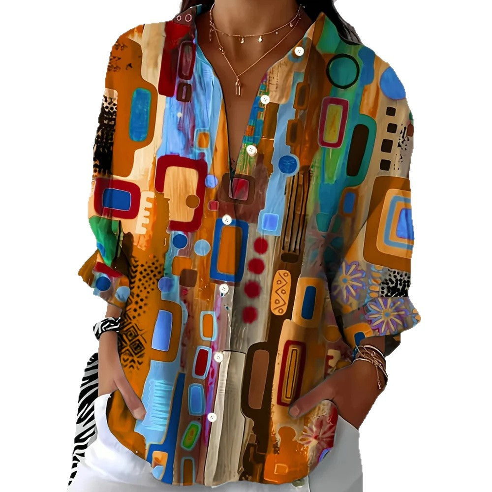 Long sleeve shirt in a colourful abstract painted print worn over white trousers, front view