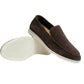Dark brown suede slip-on loafer with a thick pale sole next to a second shoe showing the sole