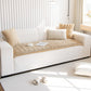 Sweet Serene Camel quilted plush sofa cover on a sofa, 90 x 210 cm