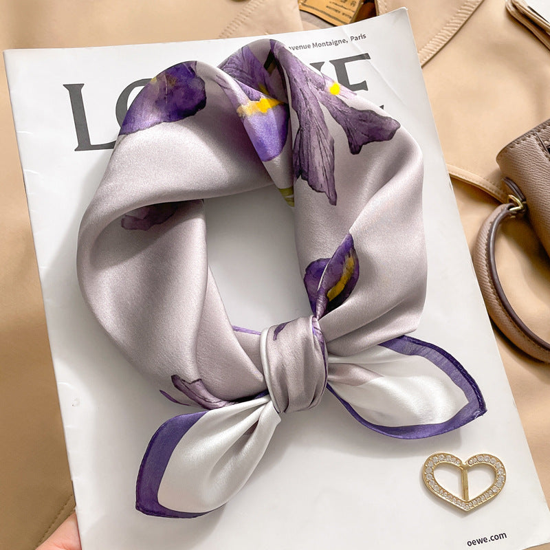 Grey and purple color block printed square scarf with a satin sheen and hemmed edges, shown displayed