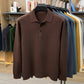 Brown long sleeve knit polo shirt with three button placket and ribbed hem, size M