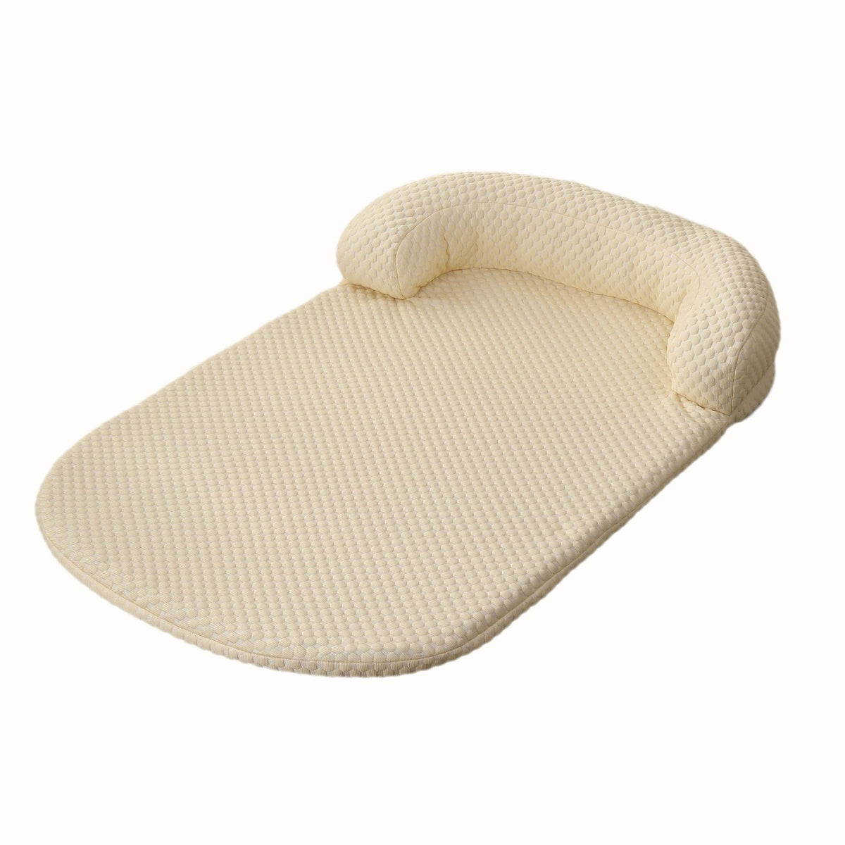 Cool touch pet bed mat with a raised headrest bolster on one long side
