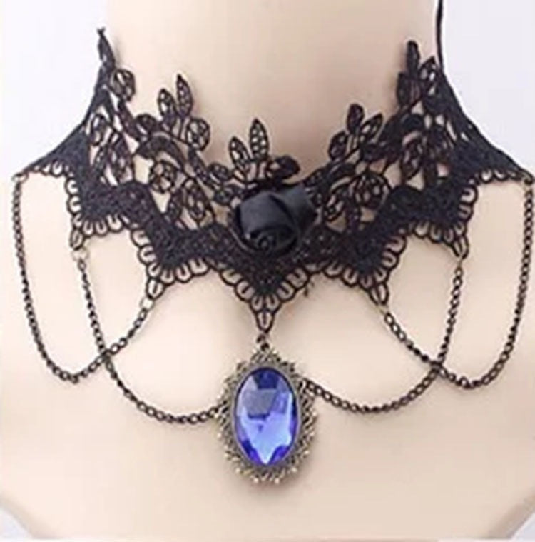 Lace choker necklace with an alloy filigree centre and small dangling beads