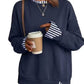 Women's gray crewneck sweatshirt with contrast white ribbed cuffs and split hem