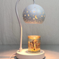 Star and moon pierced ceramic shade on a candle warmer lamp