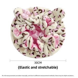 Top view of the leopard print bear ear sleep cap laid flat, showing the pink satin lining and a 30 cm measurement