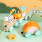 Wooden train cars taken apart showing bead maze arch, bare stacking pegs and nesting rainbow blocks