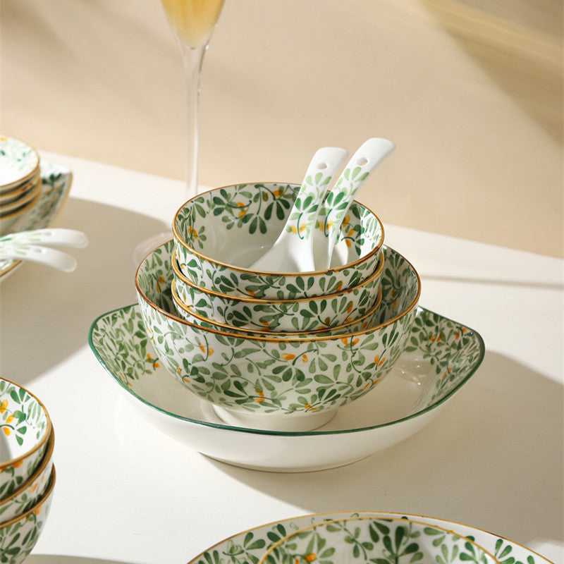 Single green leaf porcelain rice bowl with a slim gold-tone rim