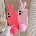 Deep pink and light pink silicone rabbit iPhone cases held up side by side