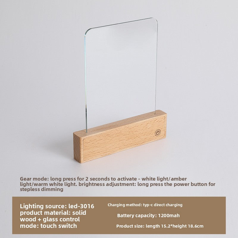 Solid wood USB reading lamp with clear glass panel and touch button on a white background