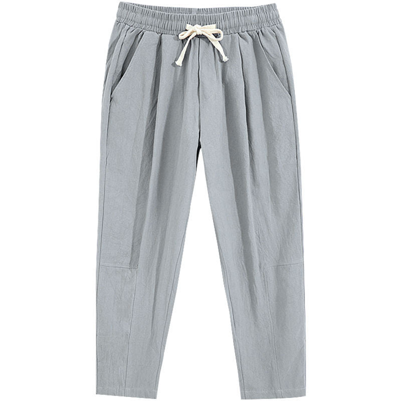 Mens wide leg cotton linen casual pants, relaxed straight cut to an ankle length hem, on model