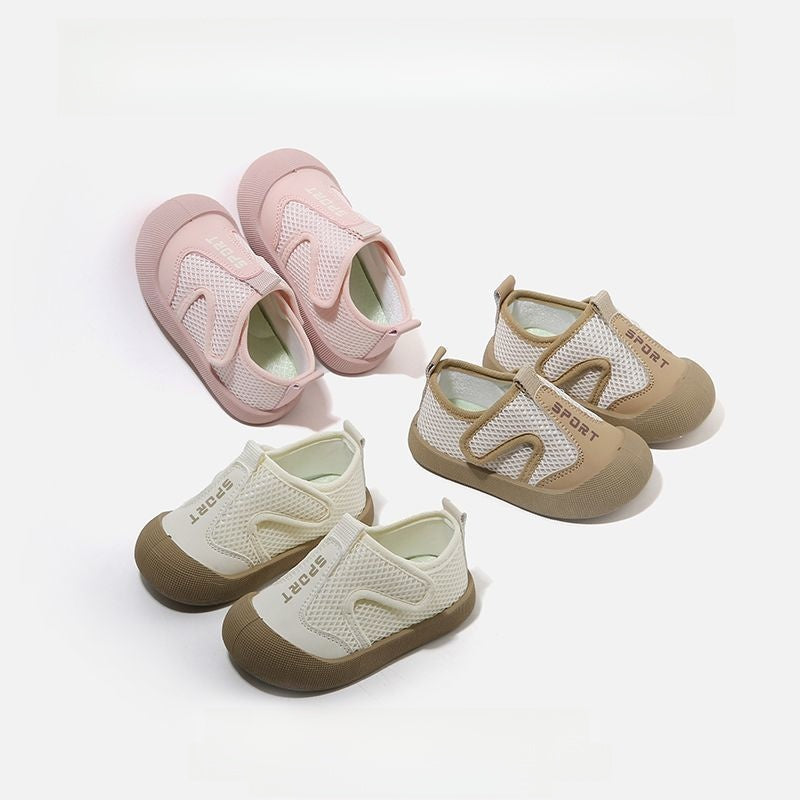 Beige toddler breathable mesh slip on sports shoe close up on the breathable white mesh upper