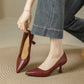 Burgundy pointed toe pumps with a 6 cm slim heel, one held in hand, Burgundy 6cm option, size 40
