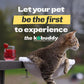 Cat leaning out of a white plush desk edge hammock beside a red drink, promotional image with headline text