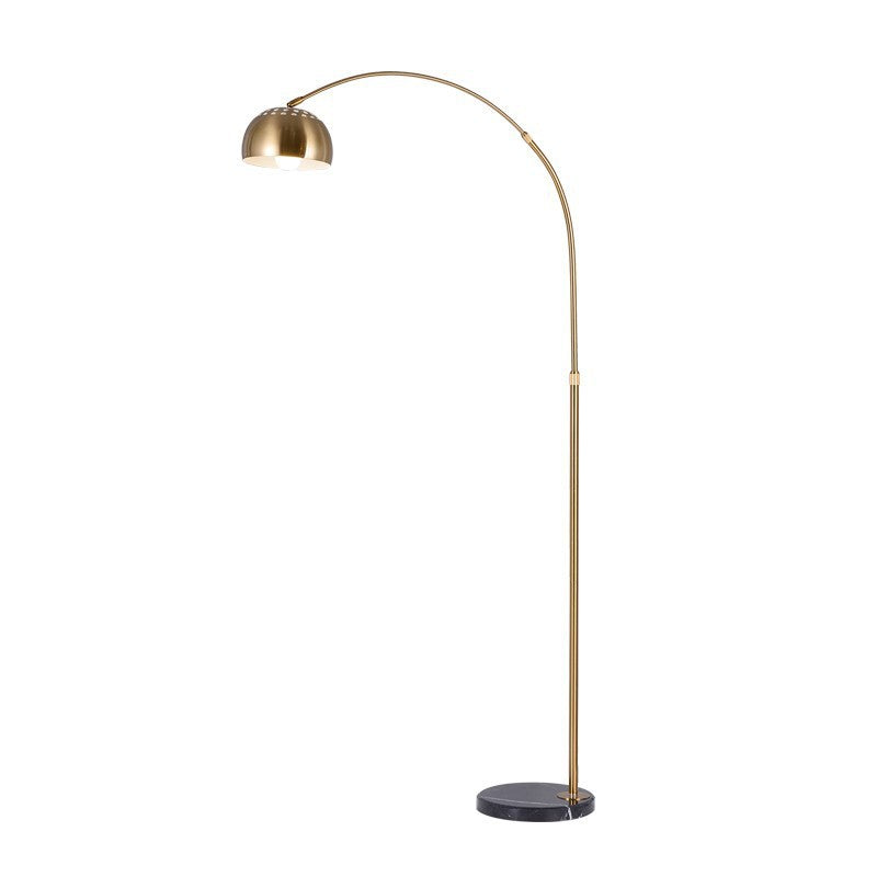 Black arc LED floor lamp with a curved stainless steel arm and marble base