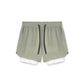 Two in one training shorts in sage green shown flat with the inner liner, drawstring close view