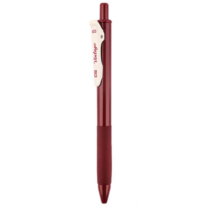 Burgundy retractable gel pen with a white Vintage clip and a grip band on a white background