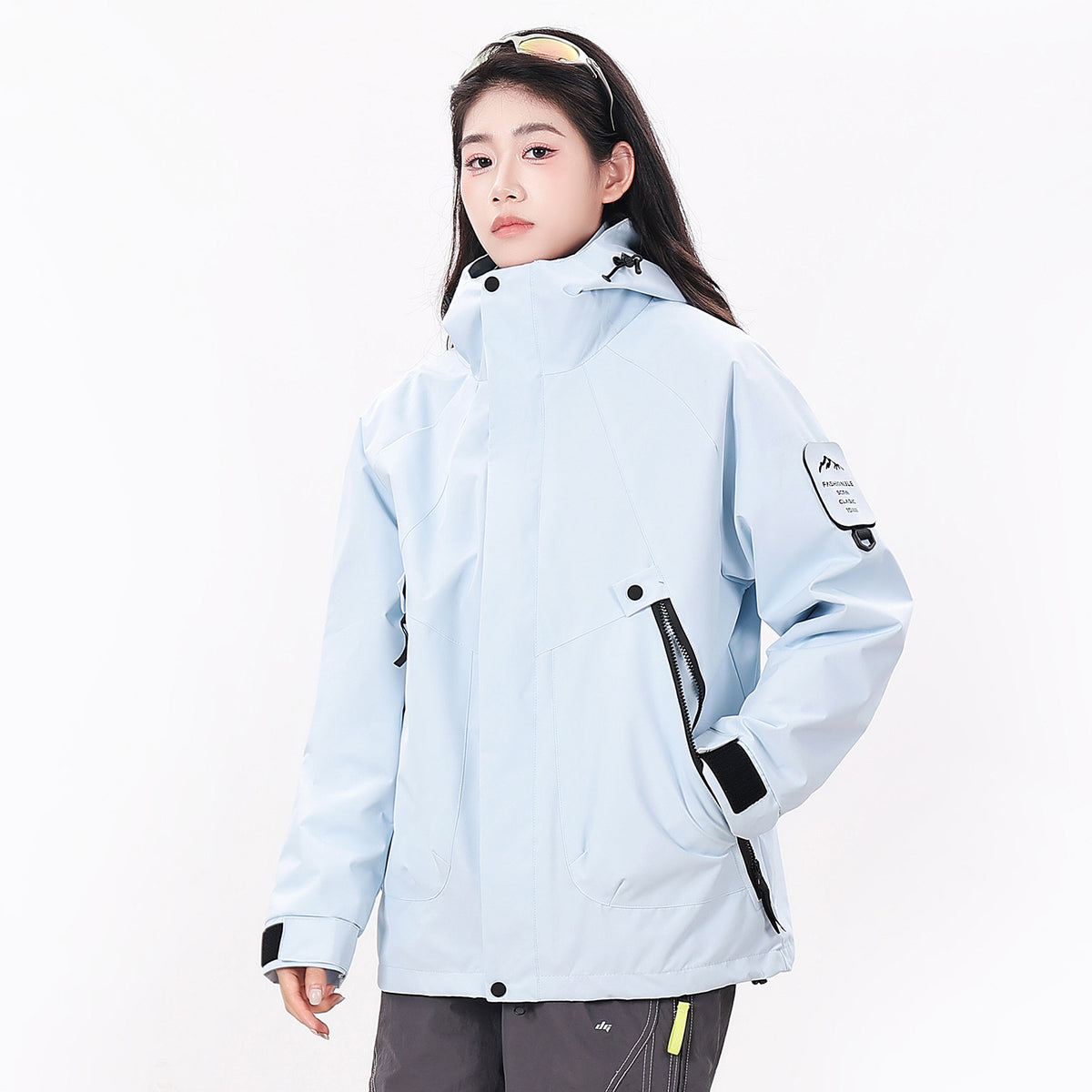 Three in one hooded jacket, wind blocking polyester outer shell over a soft zip in fleece mid layer