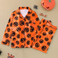 Orange Pumpkin pajama set with black jack-o-lantern faces, size XL option photo