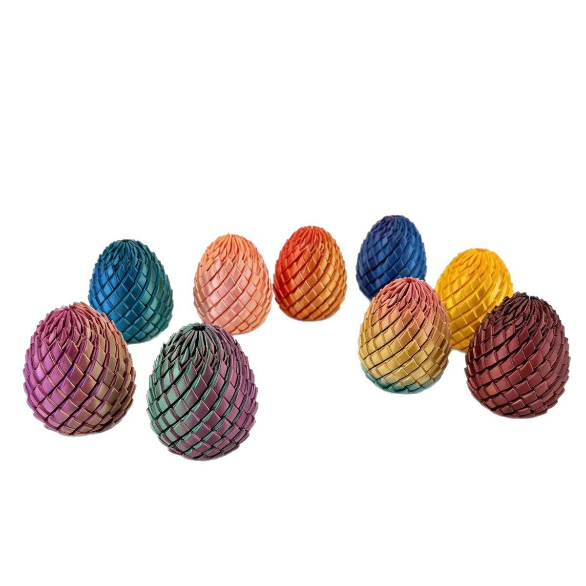 Assorted 3D printed dragon egg fidget toys in blue, gold and rainbow finishes