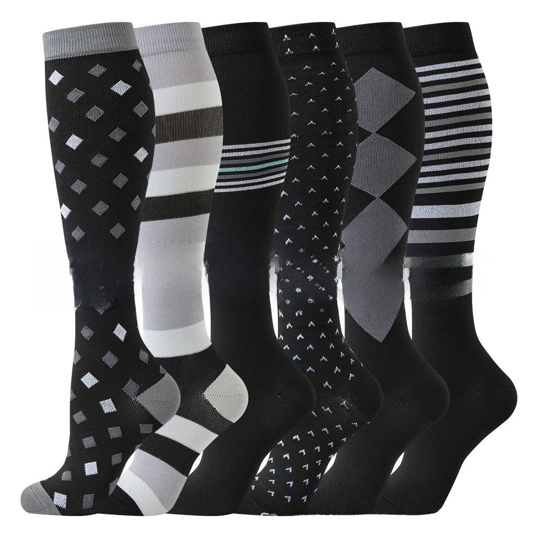 Knee high compression cycling socks with a ribbed cuff and textured sole