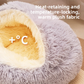 Semi-enclosed plush pet nest with a raised hood shown on a plain background