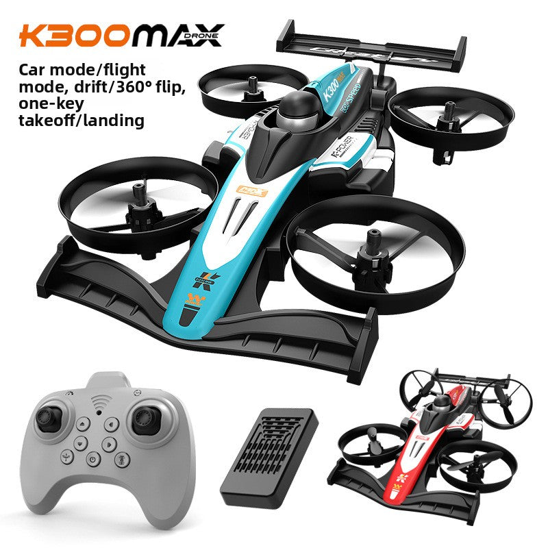 Teal and white K300 Max RC stunt drone with four guarded rotors, shown with grey handset and battery