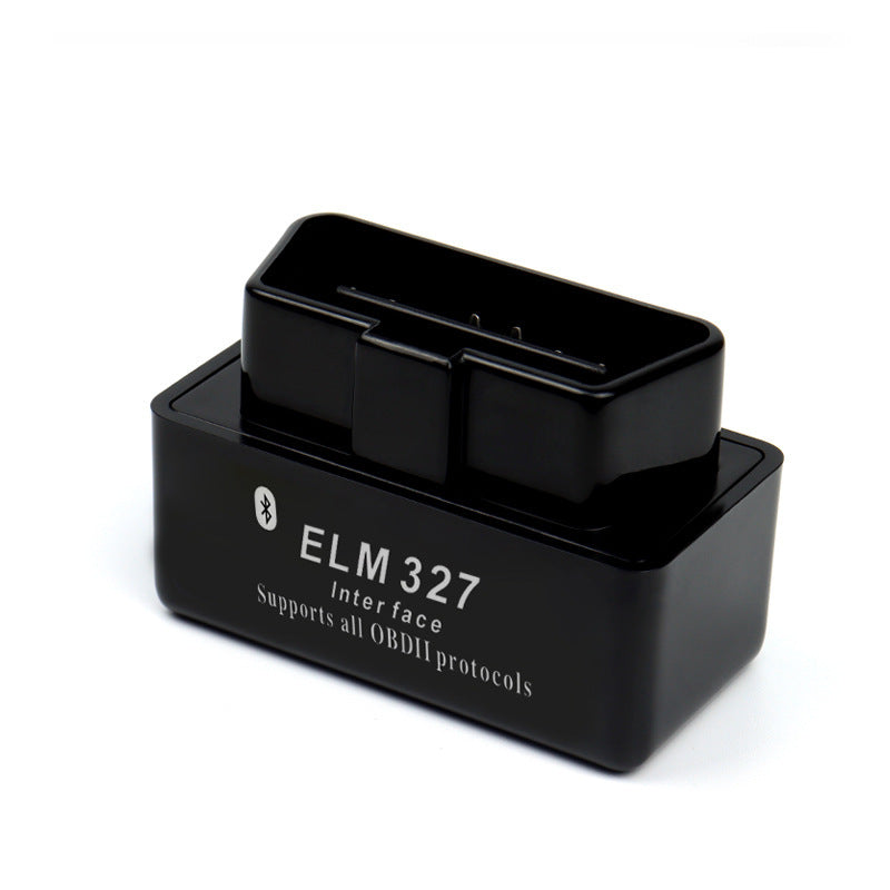 Black mini OBD2 Bluetooth scanner printed ELM 327 Interface, sixteen pin plug facing up on white