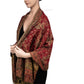 Burgundy paisley tassel shawl wrap worn draped over the shoulders with tasseled fringe ends