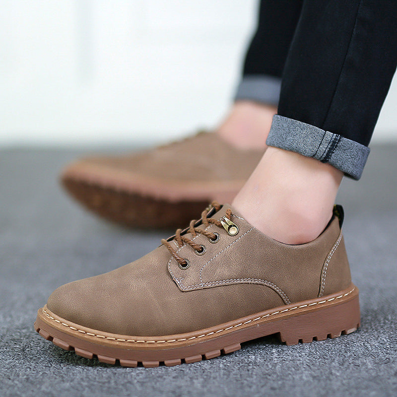 Khaki low-top lace-up derby shoe with lugged rubber sole worn with rolled jeans, EU 42 option