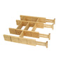Bamboo drawer divider set arranged into a compartment grid