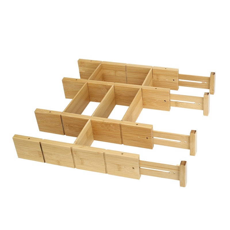 Bamboo drawer divider set arranged into a compartment grid