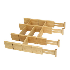 Bamboo drawer divider set arranged into a compartment grid