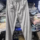 Elastic drawstring waistband detail of the wide wale corduroy trousers