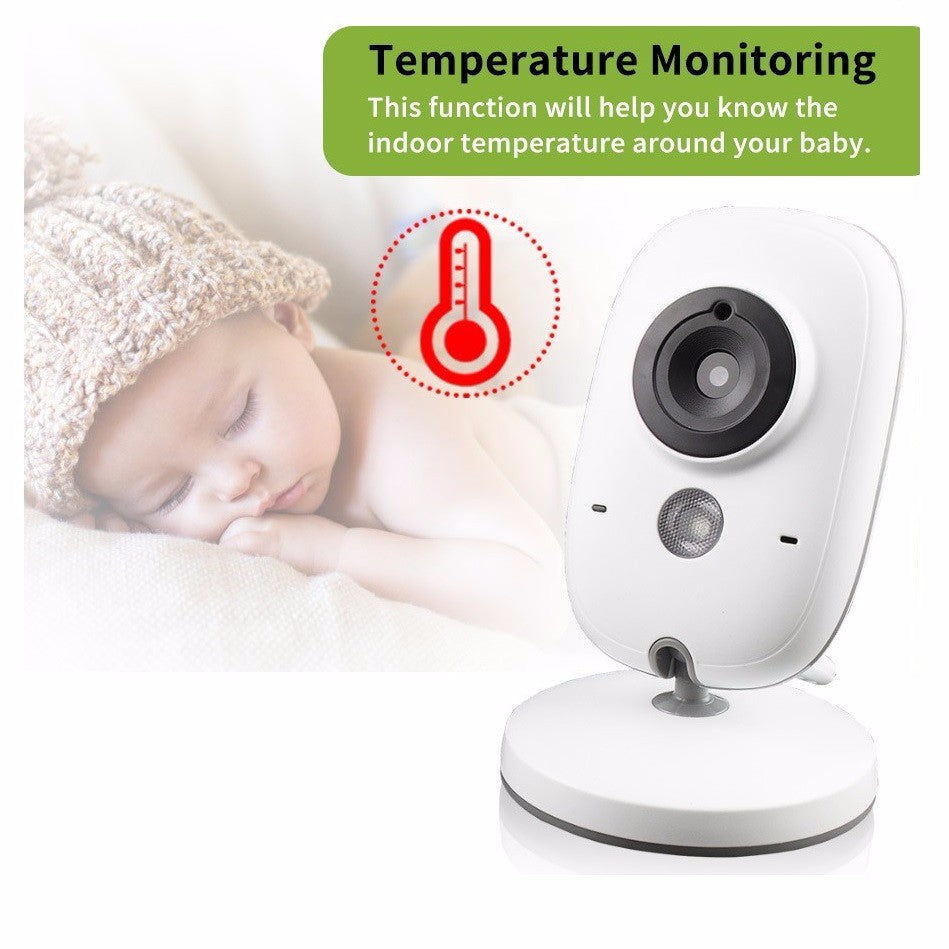 White baby monitor camera beside a sleeping baby in a knit hat with a room temperature thermometer icon