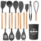 Dark gray kitchen utensil set shown flat with all twelve pieces and the matching holder