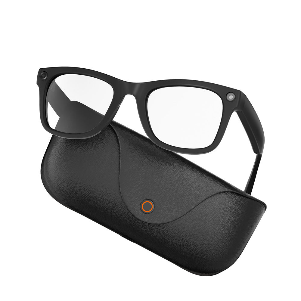 Black MT5 smart glasses with clear lens and temple camera resting on a black leather charging case