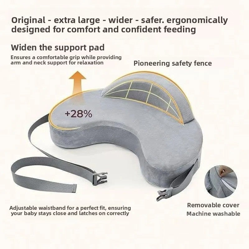 Newborn supported during feeding on the grey memory foam infant nursing pillow