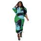 Pleated batwing midi dress with all over accordion pleats on a standing model, standing pose front
